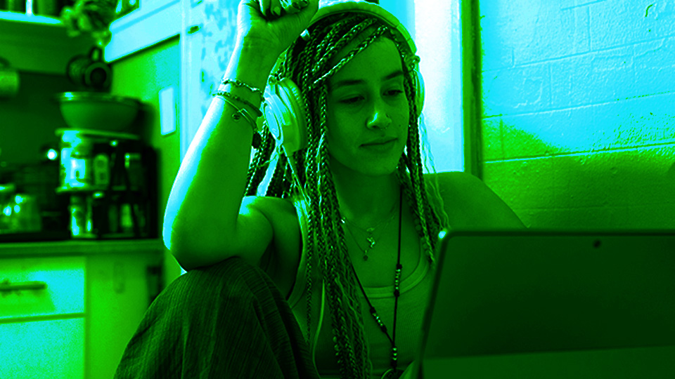 woman browsing the web confidently with a Mac VPN.